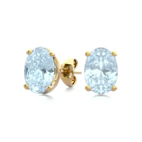 1 1/2 Carat Oval Shape Aquamarine Stud Earrings In 14K Yellow Gold Over Sterling Silver